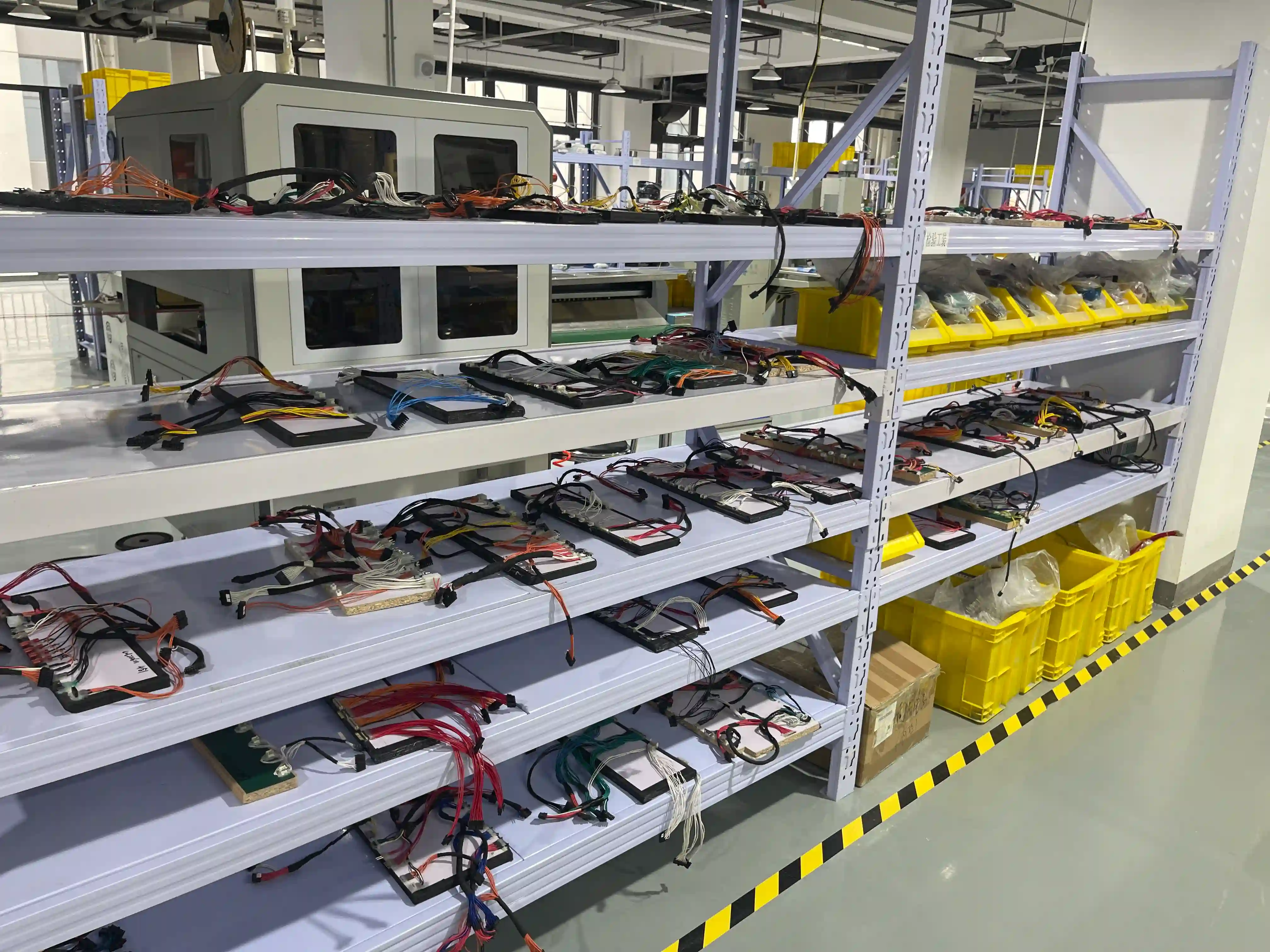 Cable loom assembly routed on a harness fixture board