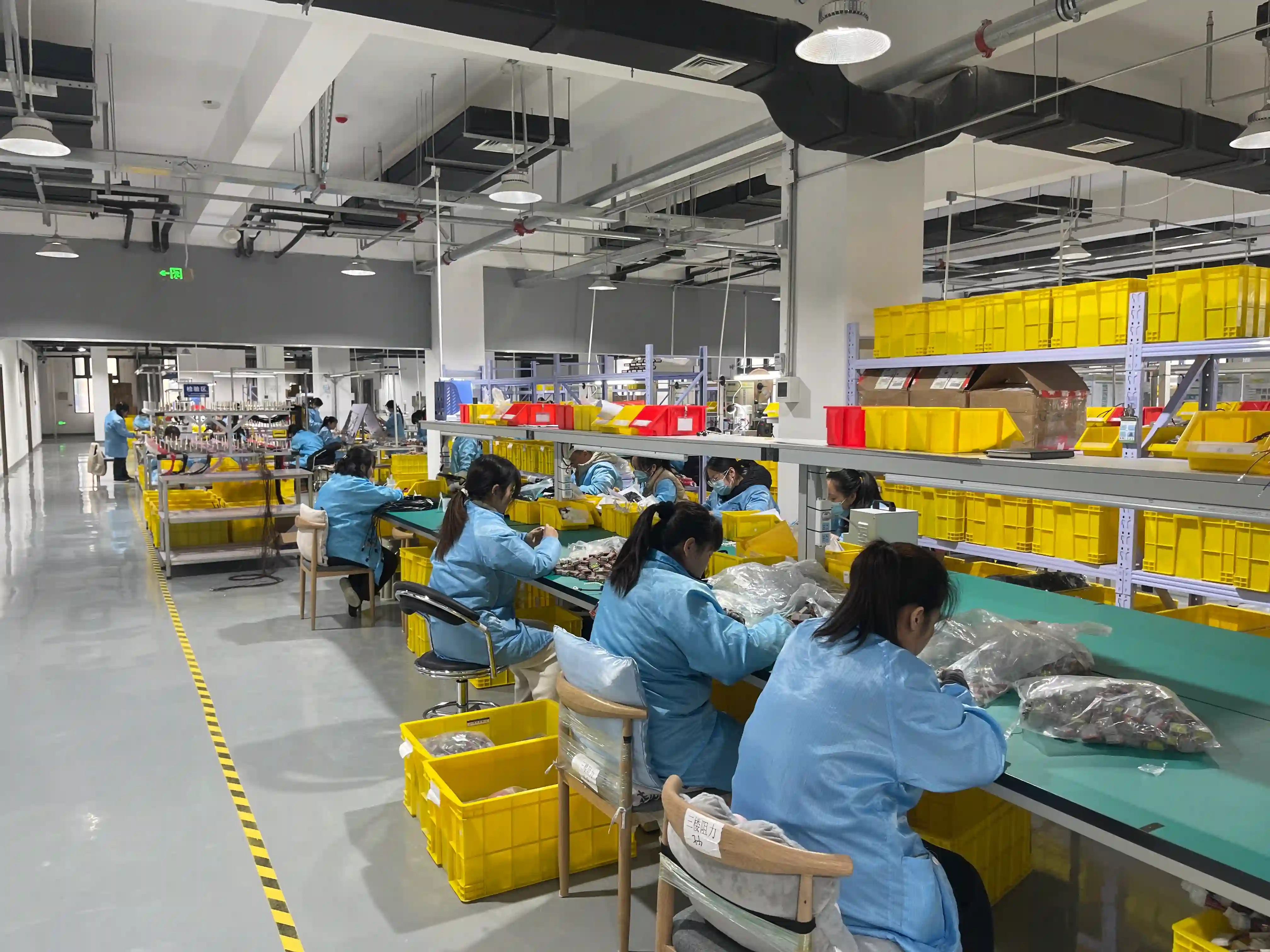 Automated wire harness assembly line with robotic equipment