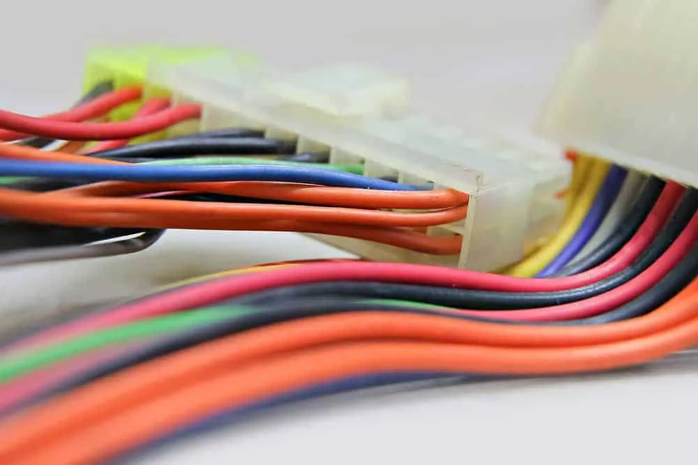 Overmolded cable assemblies with various connector types for industrial applications