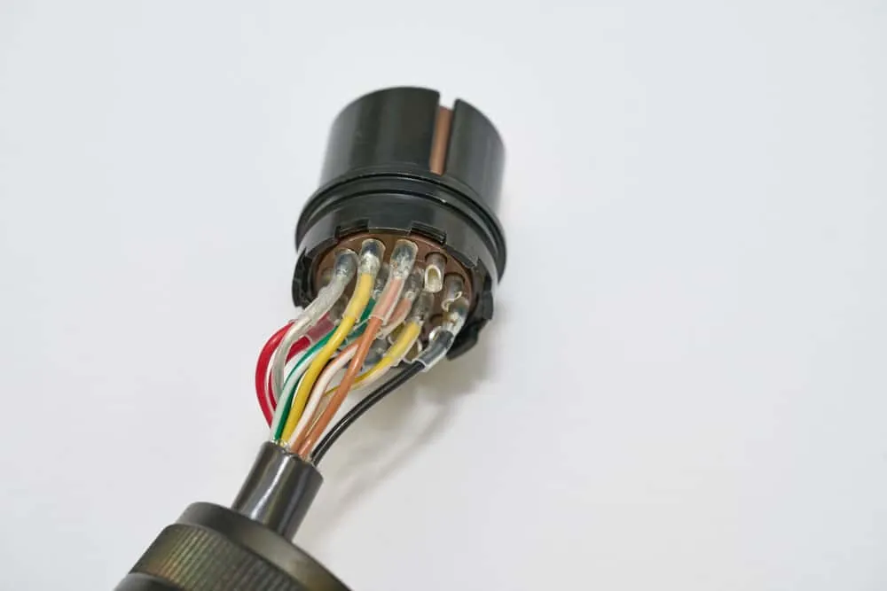Unsealed connector with exposed rear cavity awaiting potting compound fill.