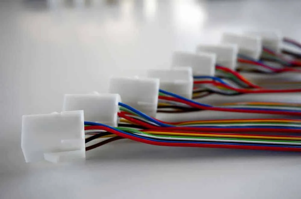 Multi-colored wire harness assemblies used in automotive production lines